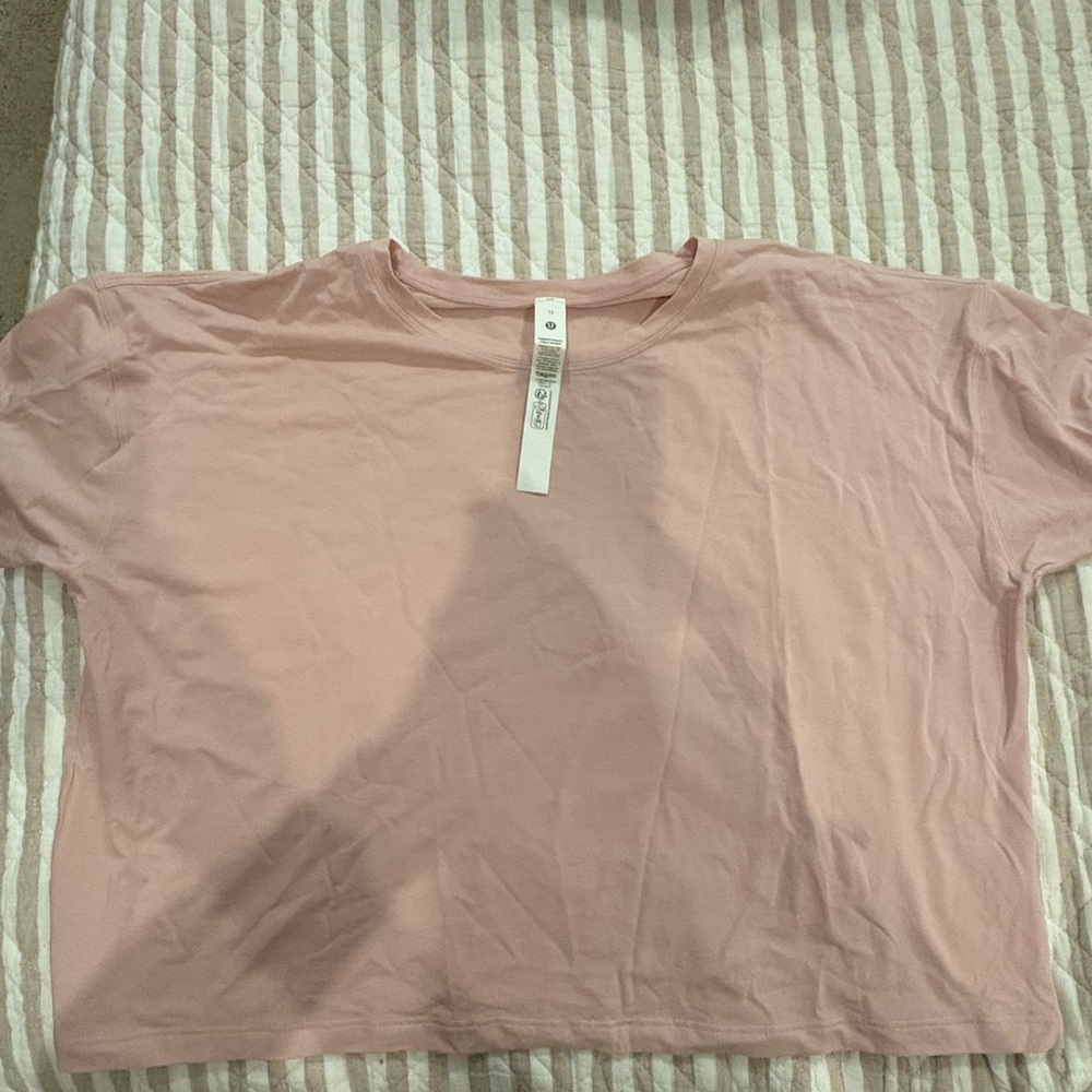 Brand new never worn without tags Cates t shirt